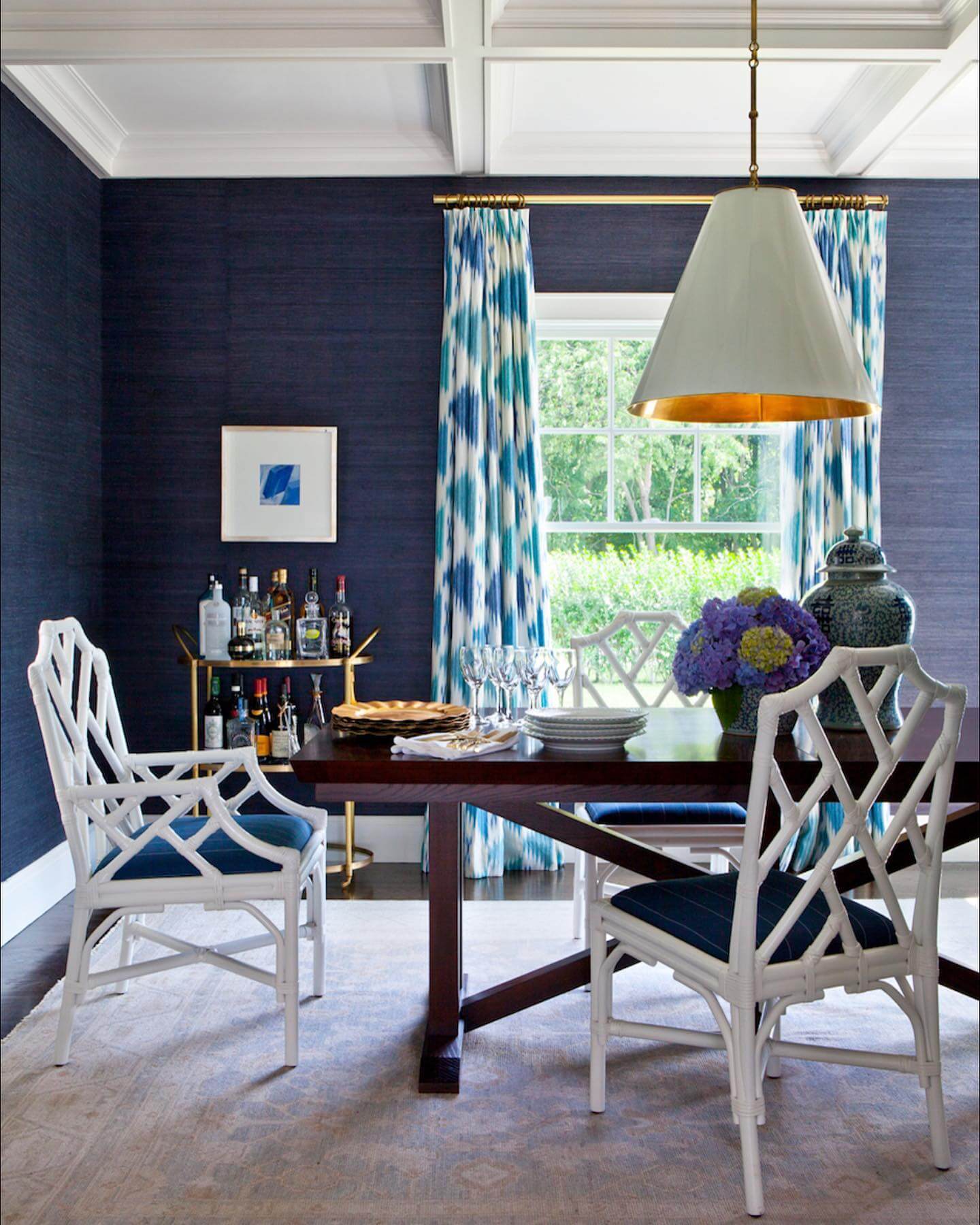 White Lattice Chairs Contrast with Dark Wood Table