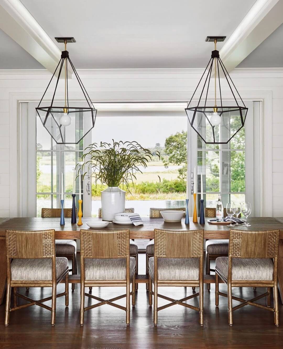 Geometric Black Lanterns Frame a Water View