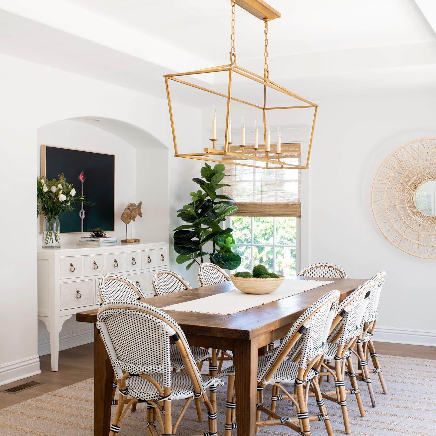 Rattan Chairs with Black and White Cushions Add Coastal Feel