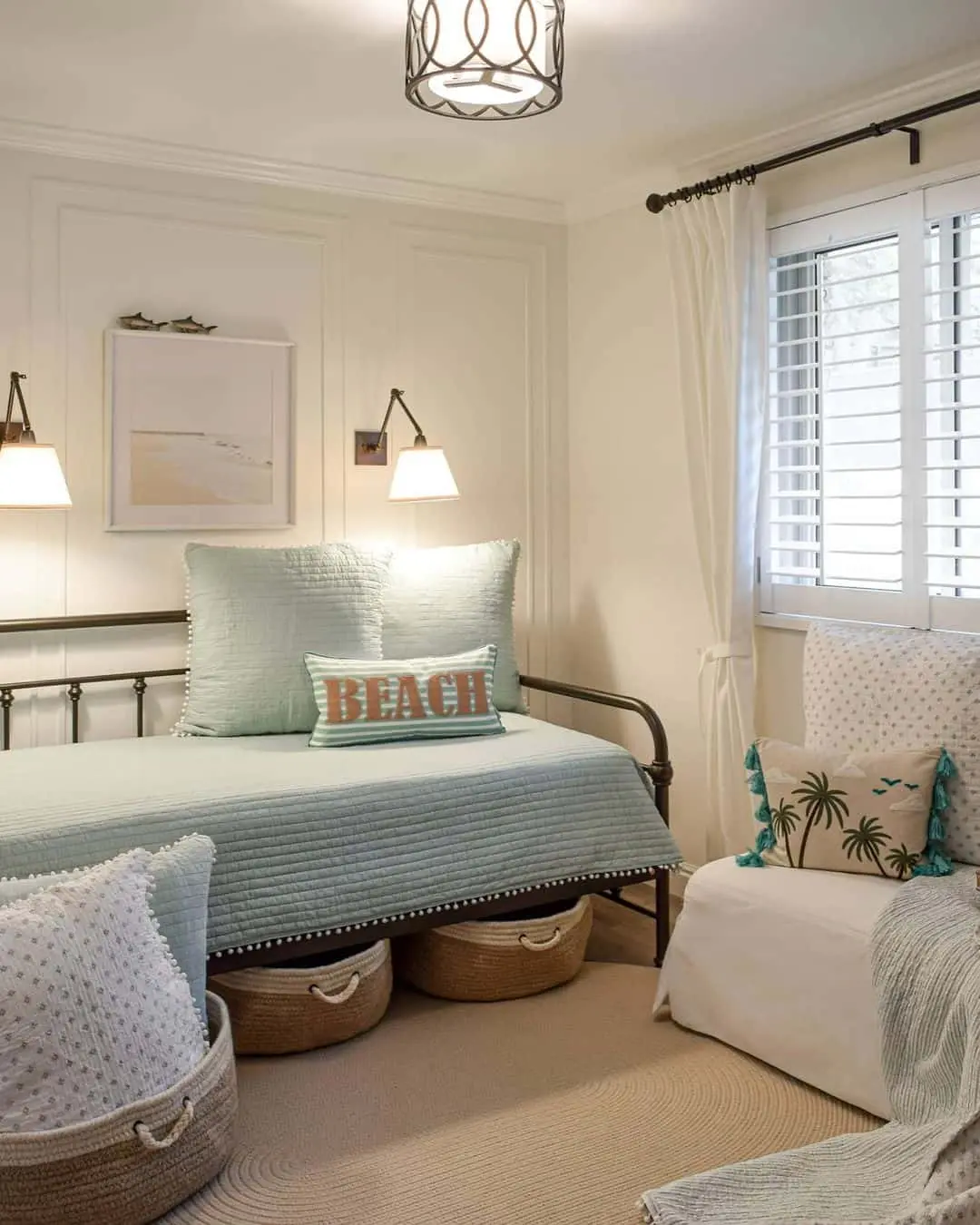 Woven Baskets Add Natural Storage Under a Daybed
