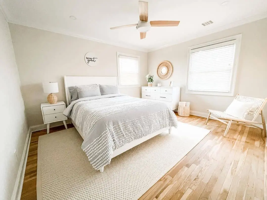 Round Rattan Mirror Adds Natural Texture Above Dresser