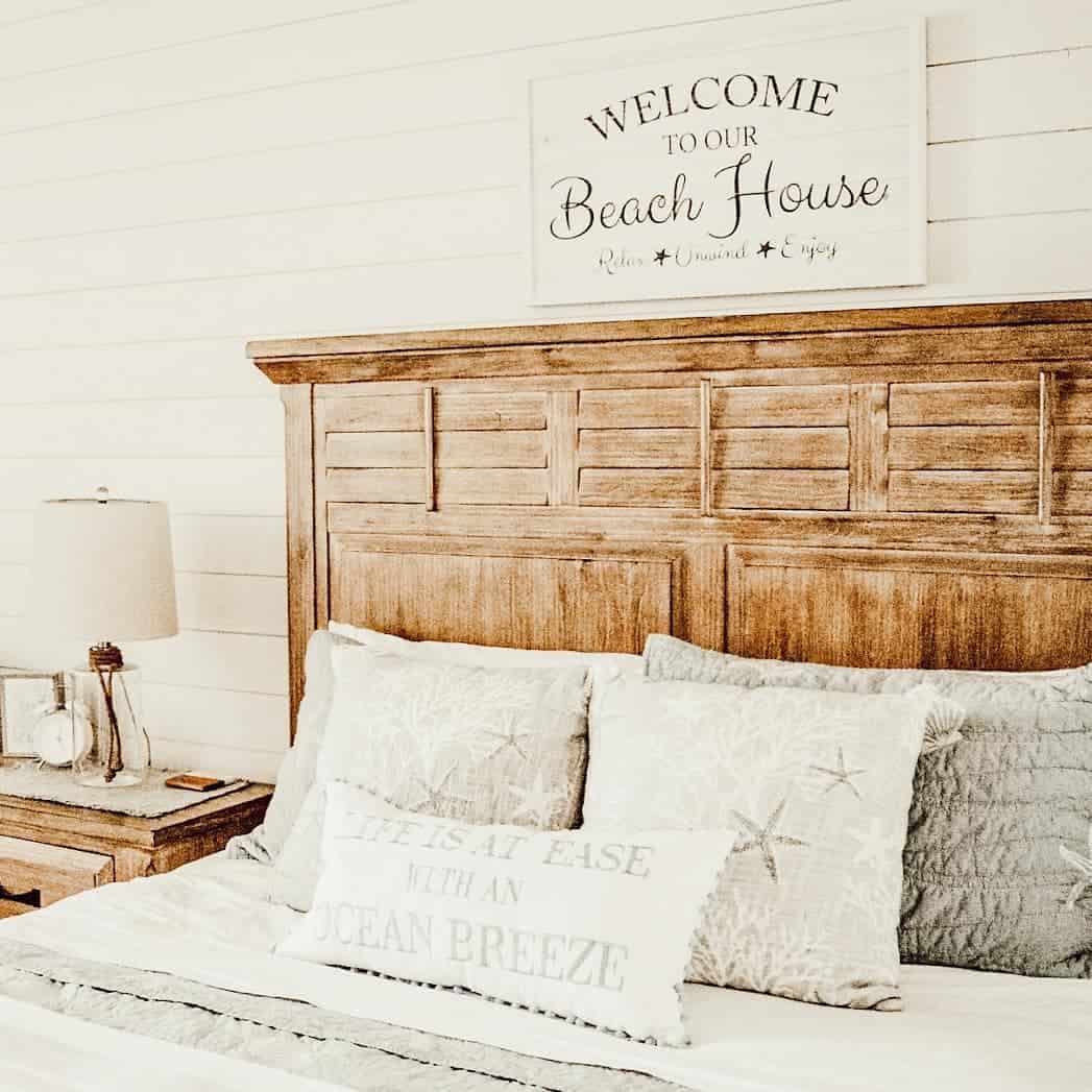 Shiplap Walls Frame a Rustic Wood Headboard