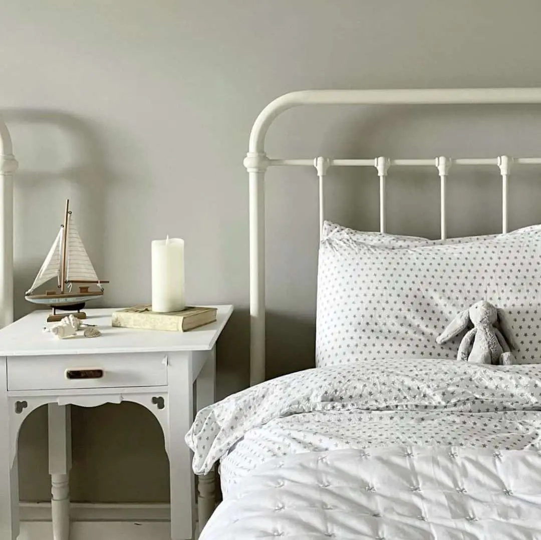 Model Sailboat Adds Nautical Charm to Coastal Nightstand