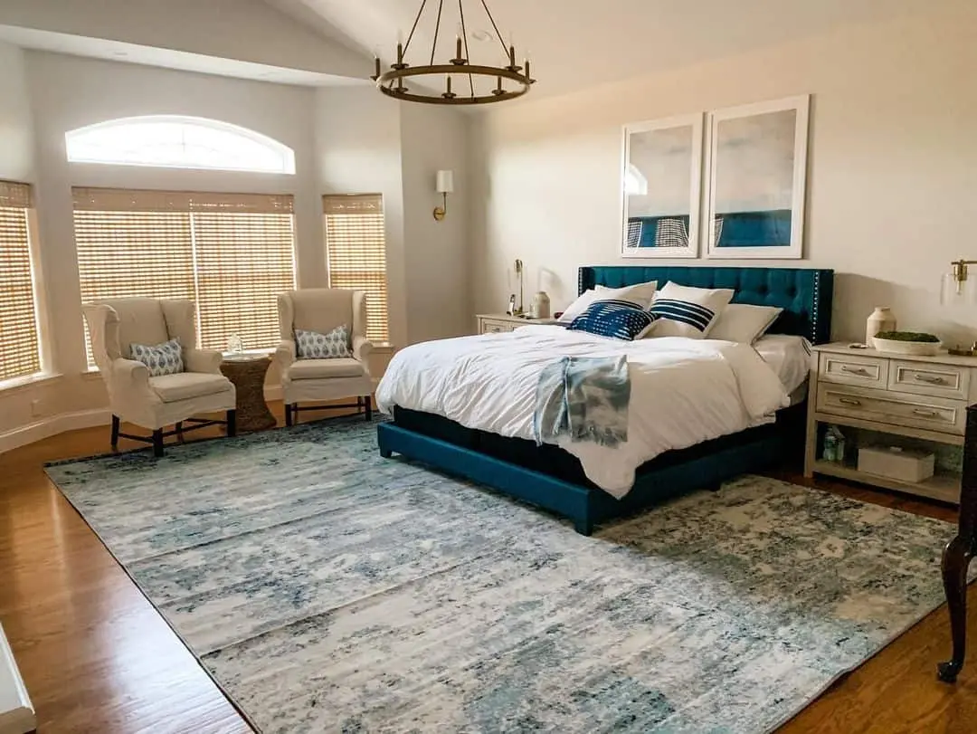 Teal Tufted Headboard Anchors Coastal Bedroom Palette