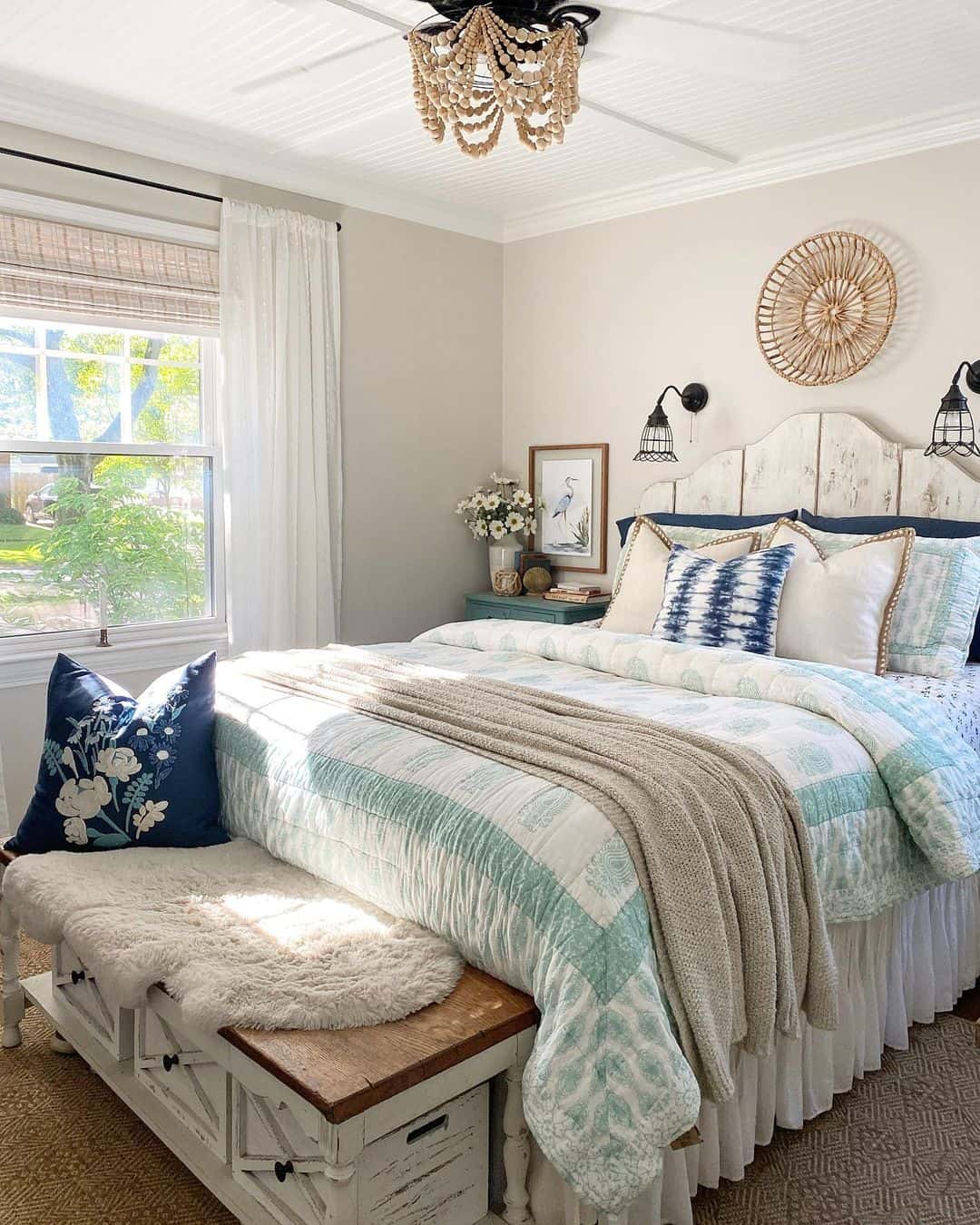 Distressed White Headboard Adds Rustic Charm to Coastal Bed