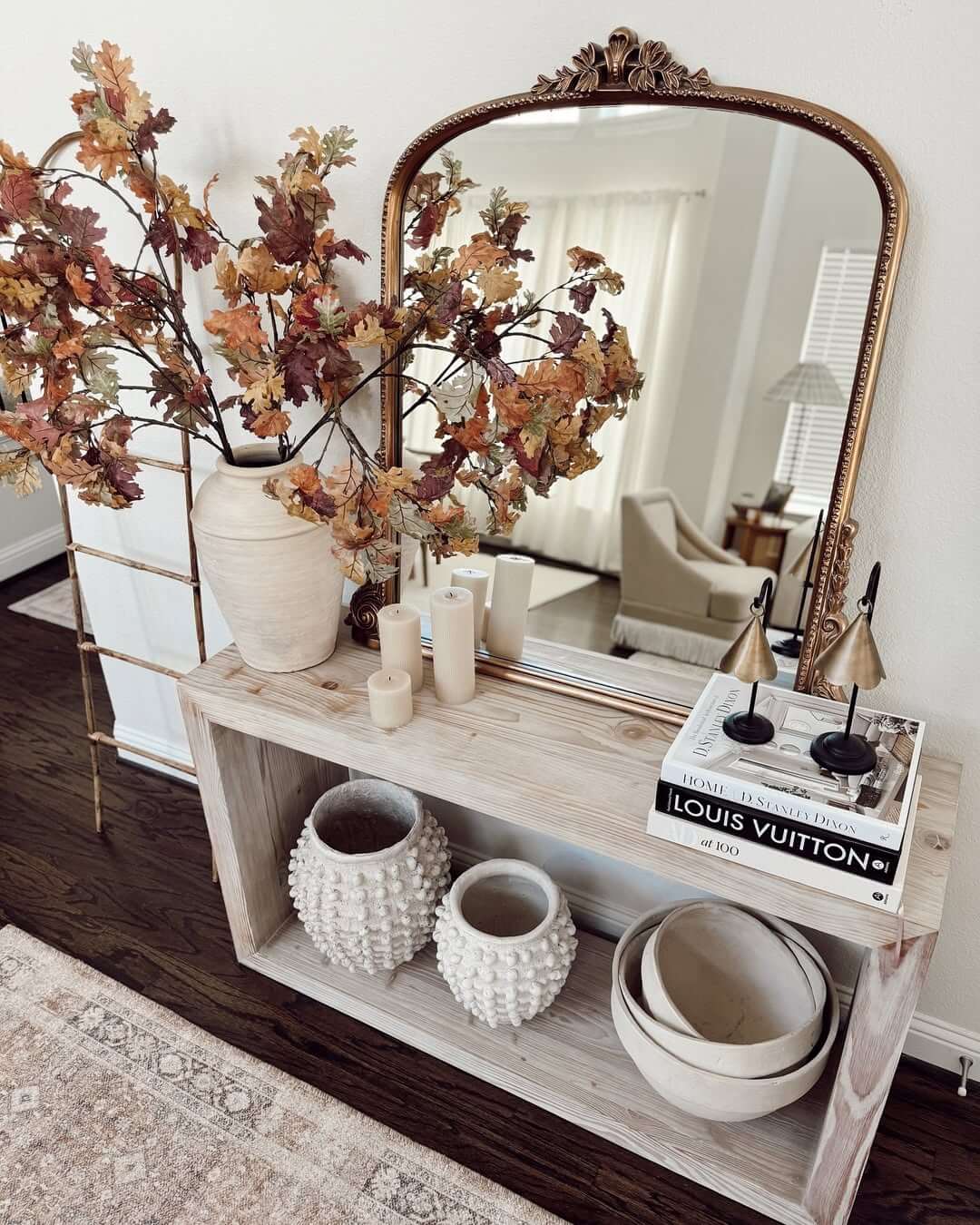 Textured White Vases Add Tactile Interest to Console Shelf