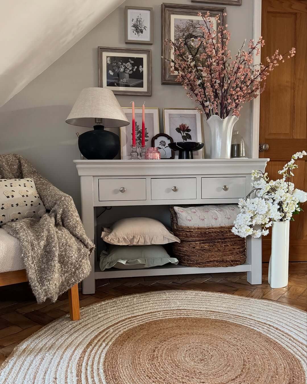 Grouped Pillows and a Woven Basket Add Cozy Storage