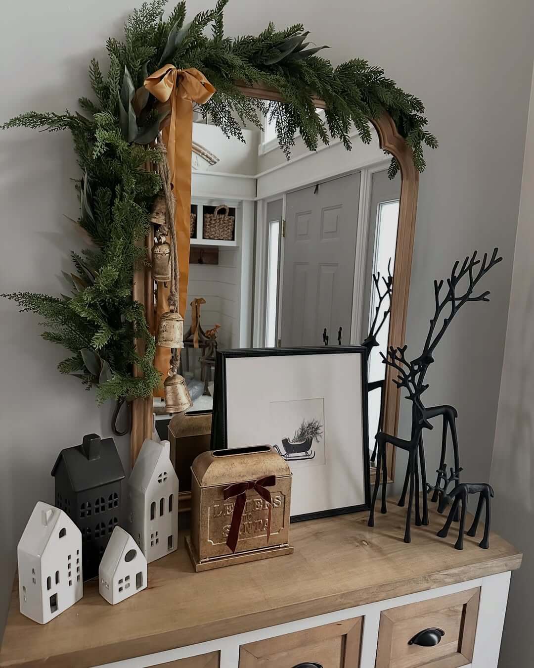 Grouped Ceramic Houses Add Whimsical Charm to Console Table