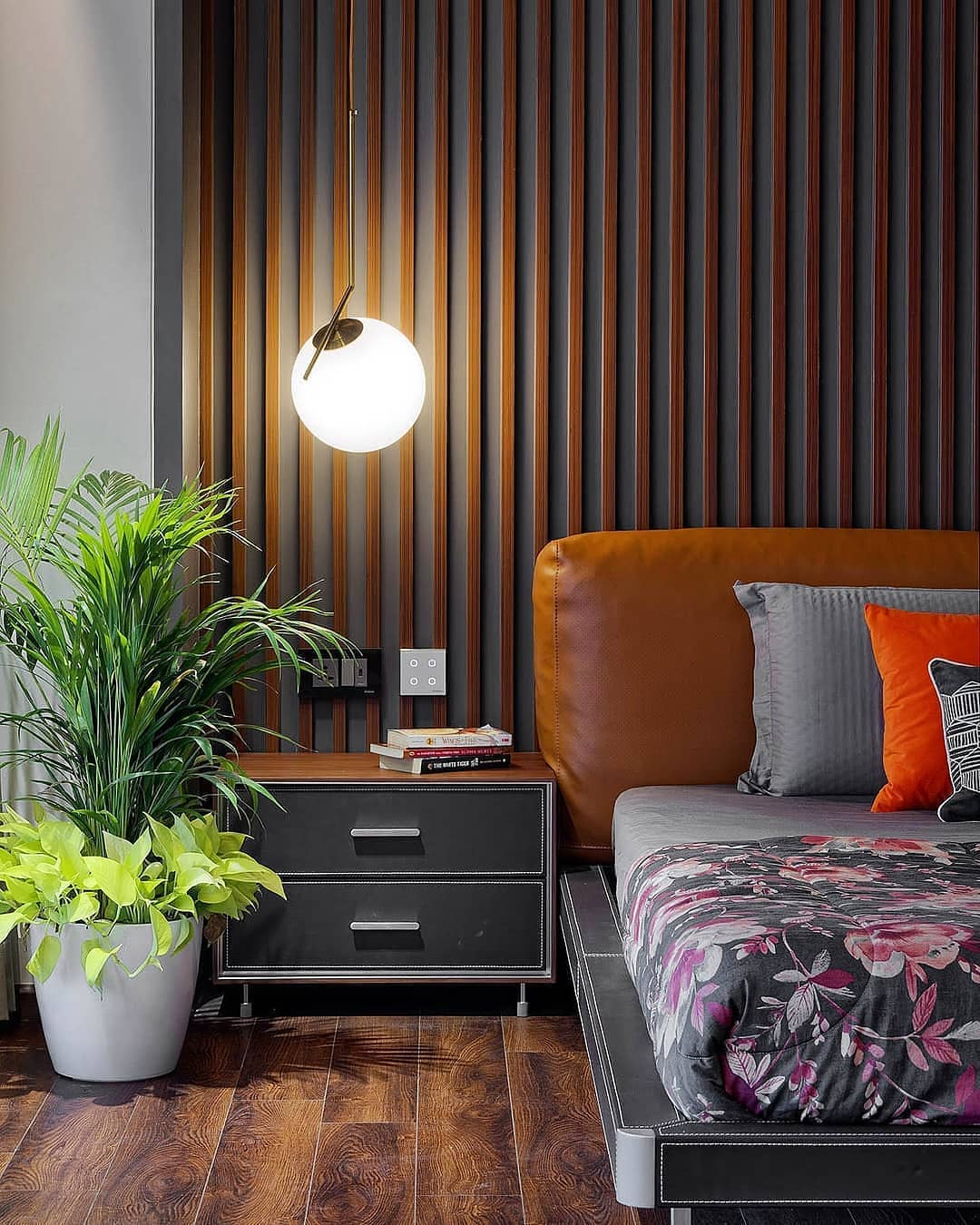 Vertical Wood Slats Create a Striking Headboard Wall