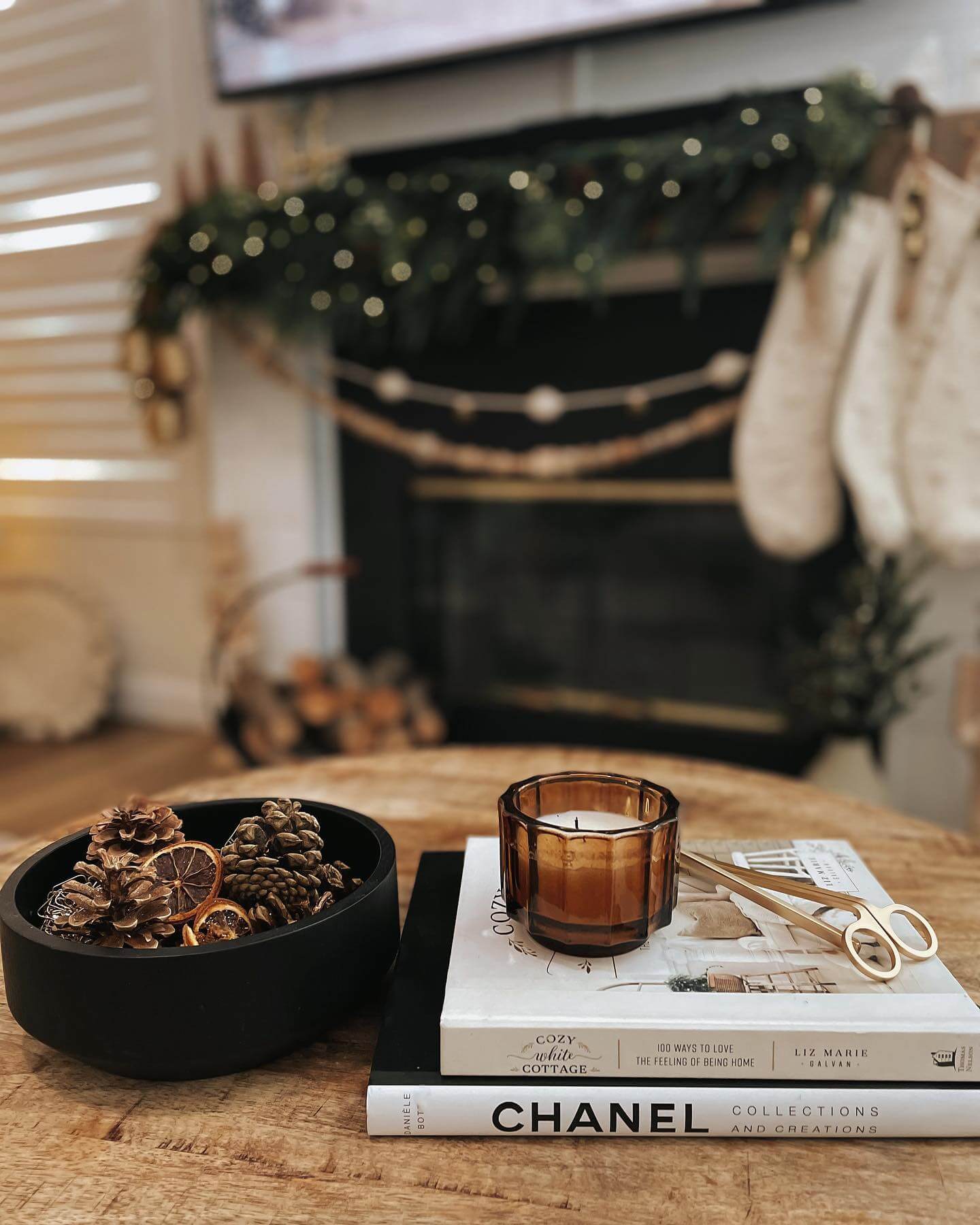 Stack Books to Display a Textured Amber Candle