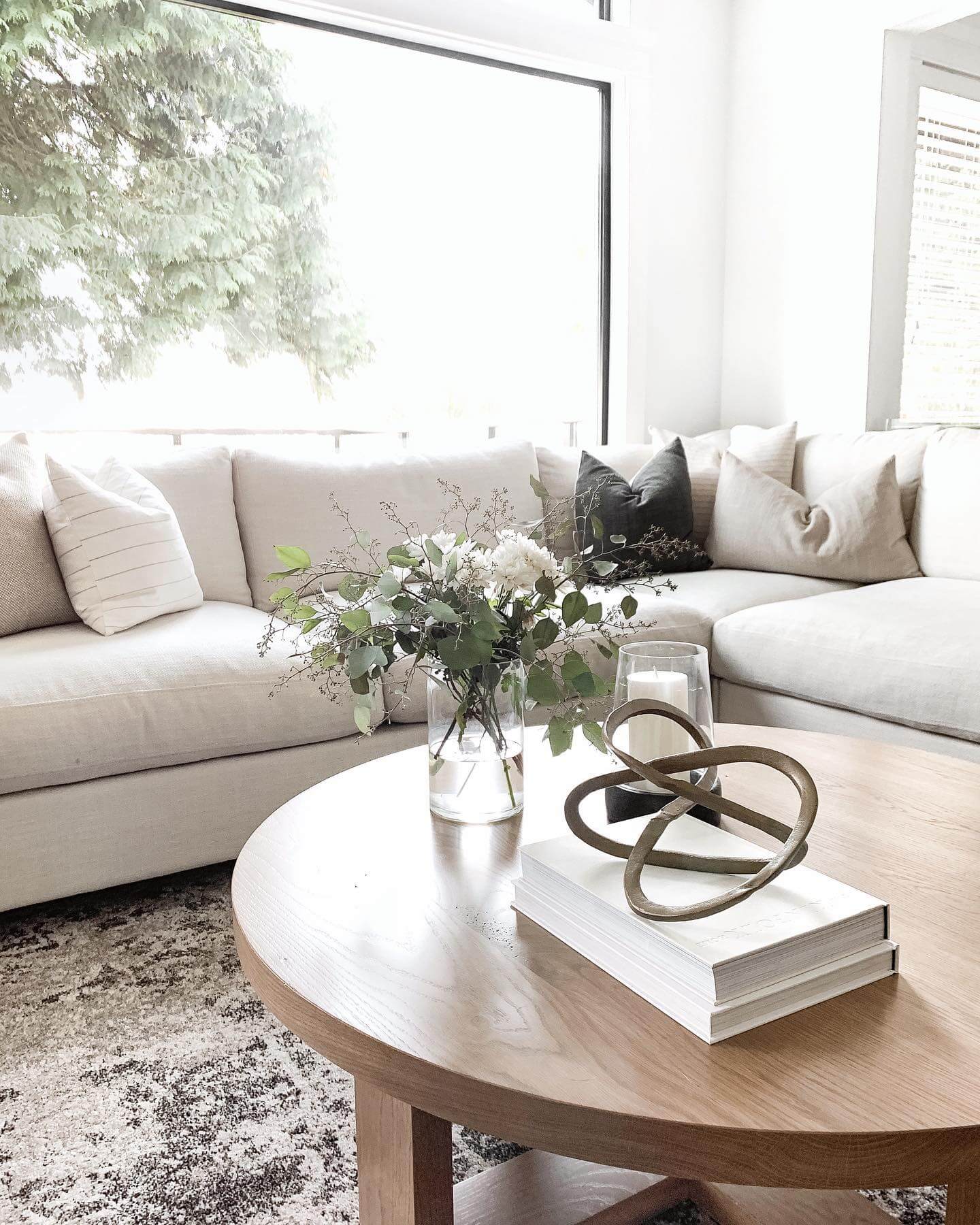 Top White Books with an Abstract Metal Sculpture