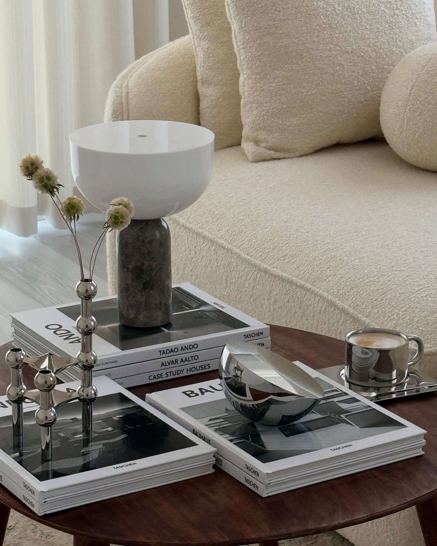 Shiny Silver Candlestick Adds a Sculptural Touch