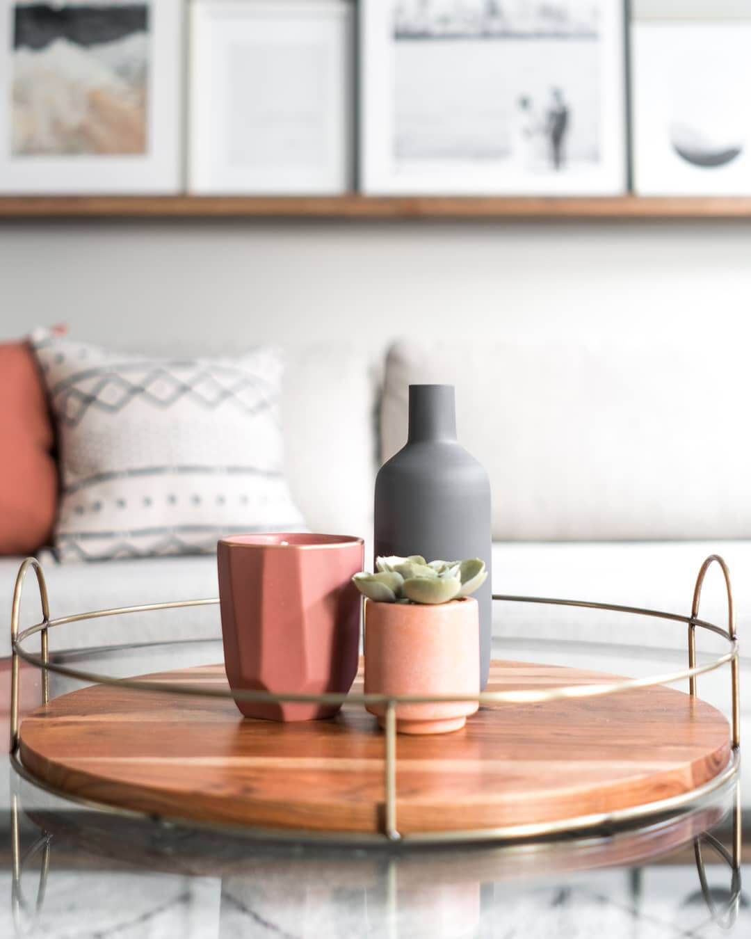 Group Pink and Gray Accents on a Round Wood Tray