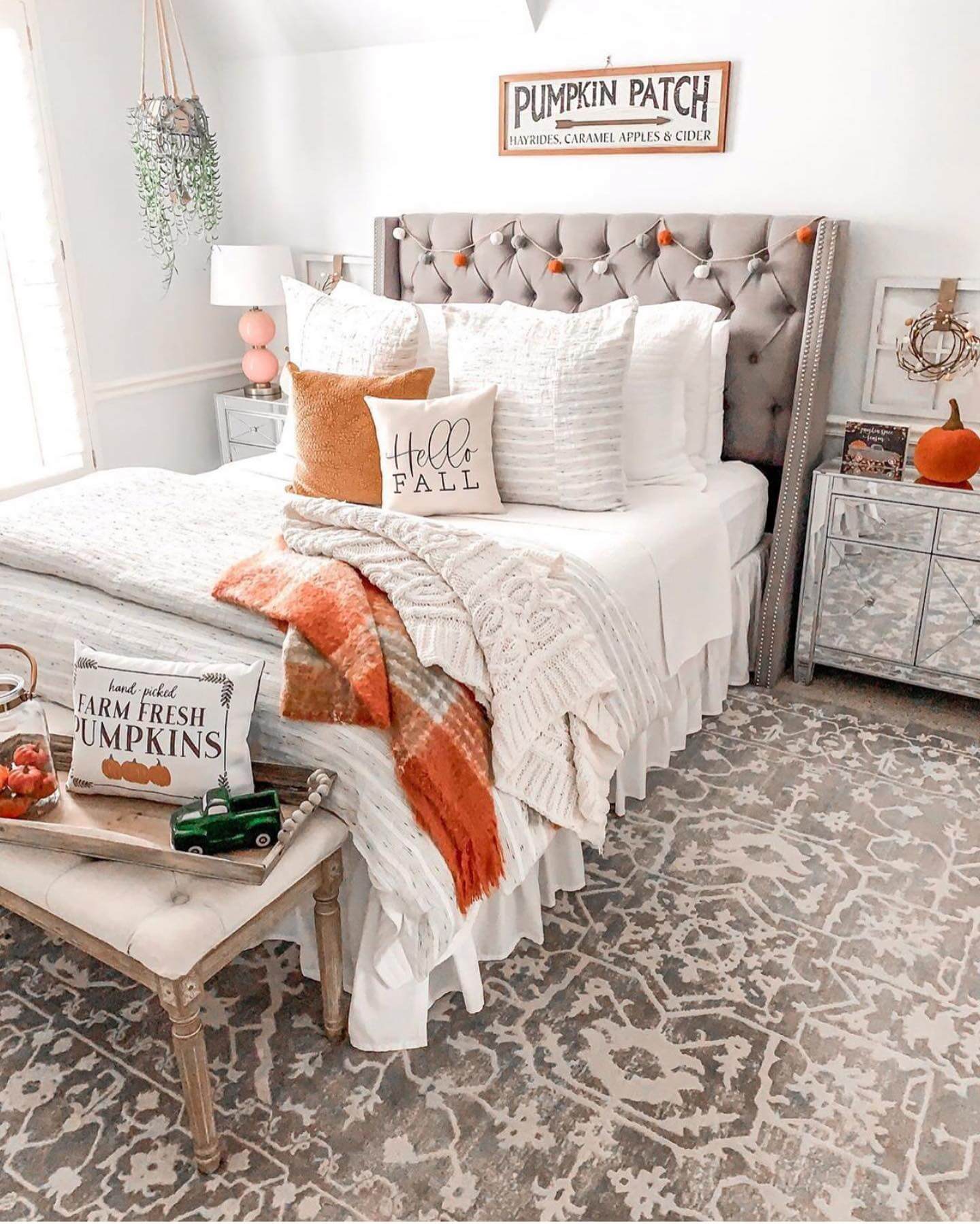 Tufted Headboard Adds Cozy Texture With Pom-Pom Garland