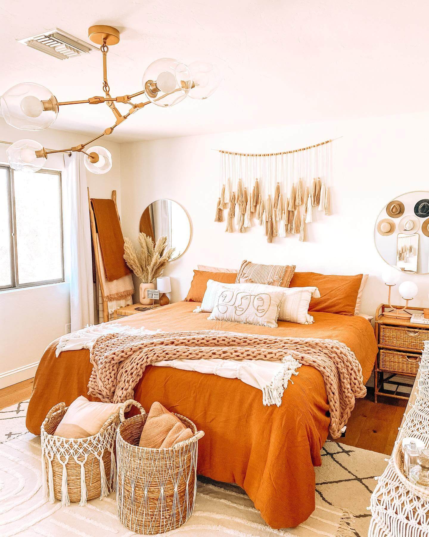 Two Macrame Baskets Hold Extra Pillows for Cozy Layering