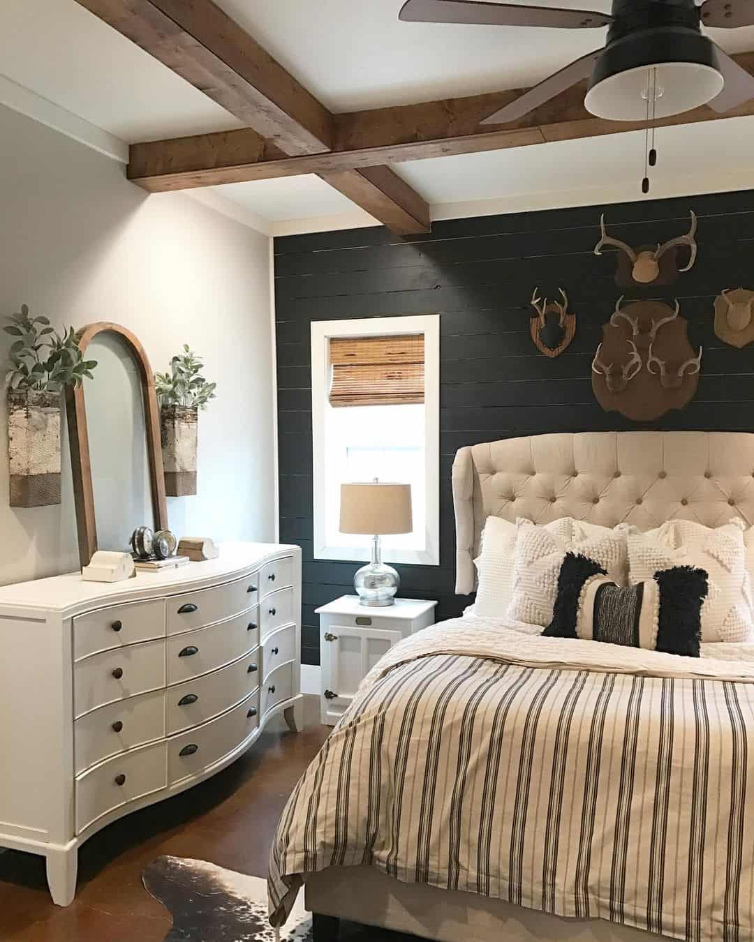 Contrast with a Dark Shiplap Wall and Antlers