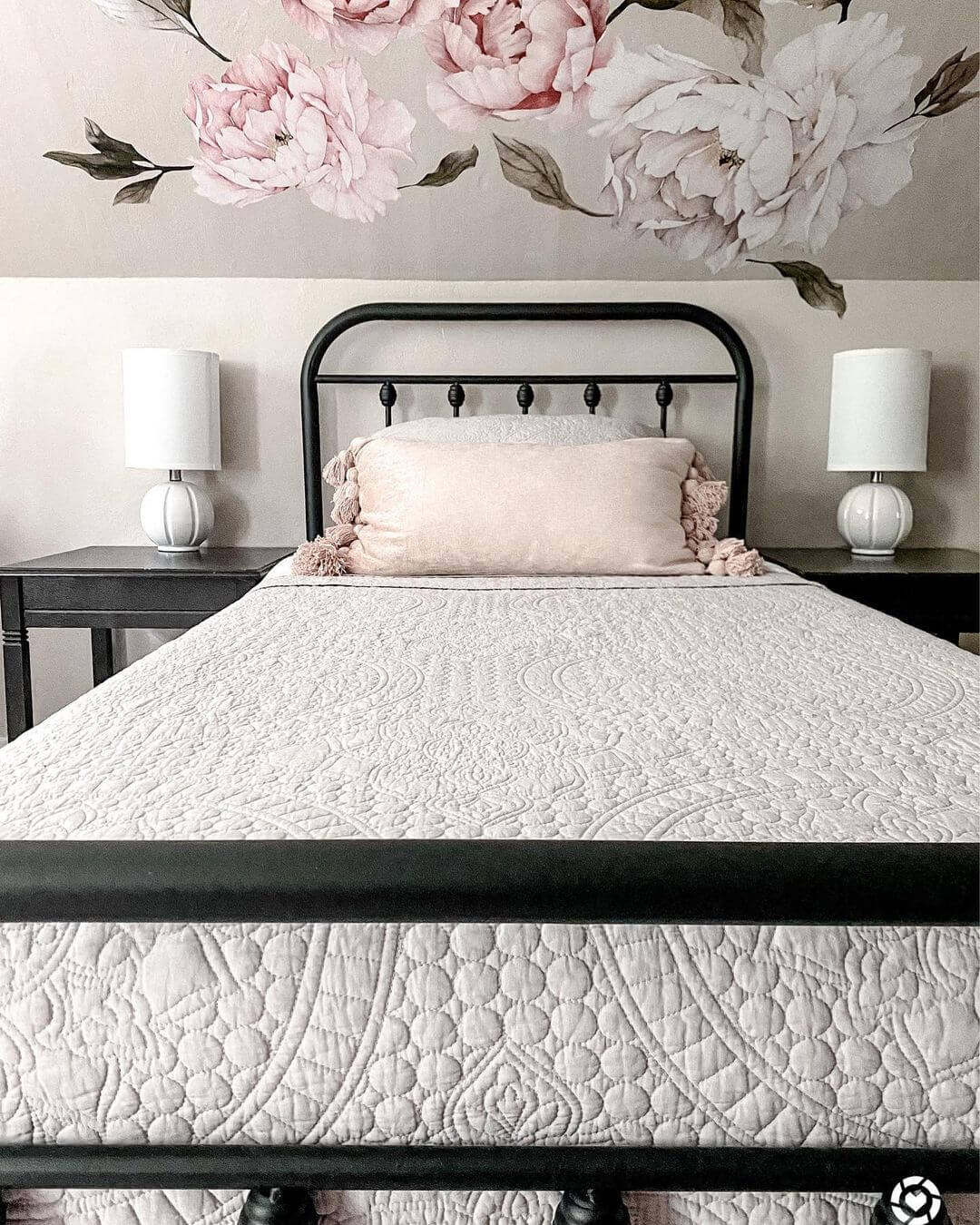 Oversized Floral Wall Decals Add a Whimsical Touch Above the Bed