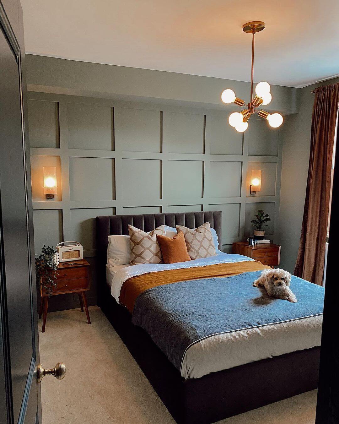 Paneled Wall Creates a Modern Grid Backdrop for the Bed