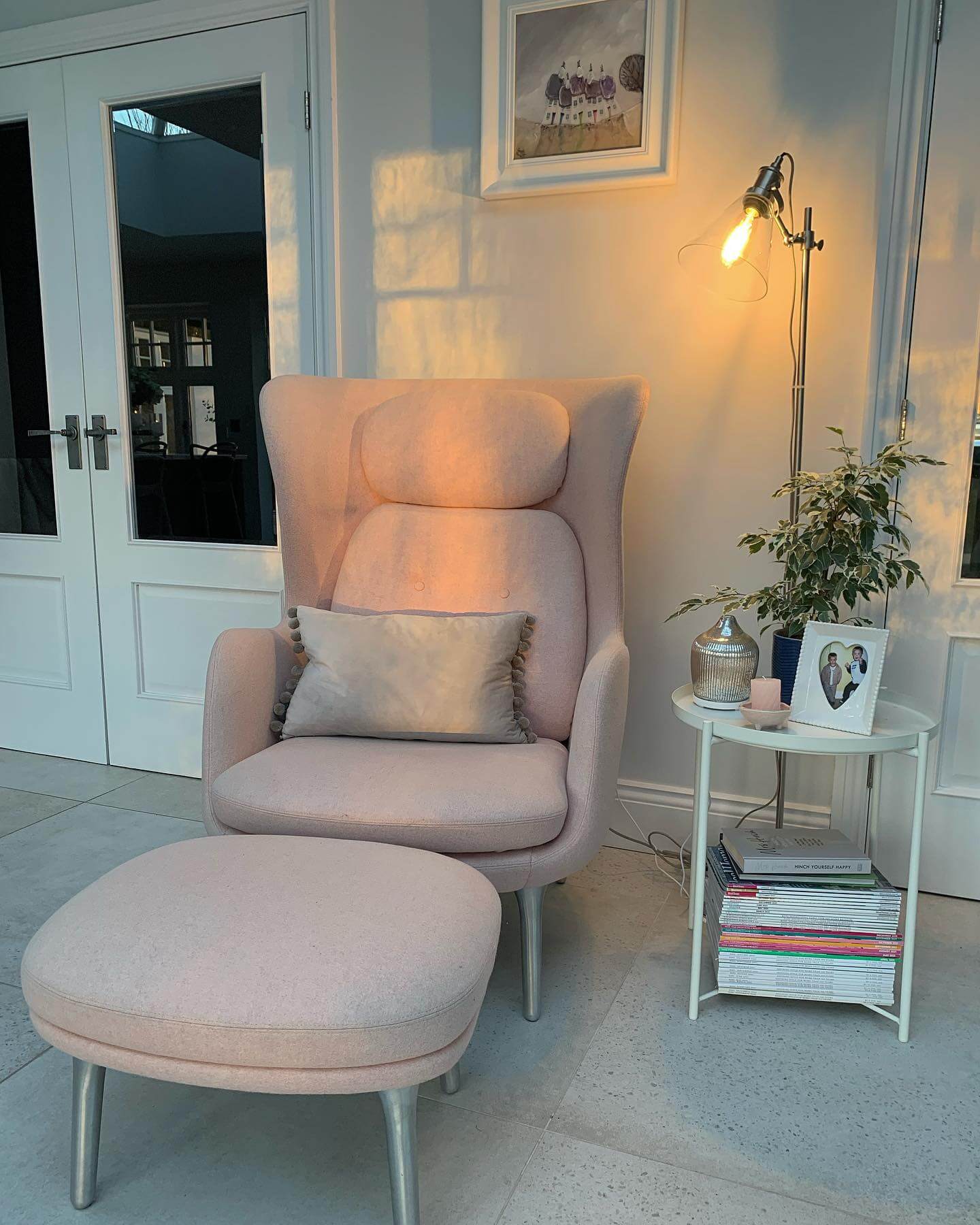 Pink Wingback Chair and Ottoman Create a Plush Reading Retreat