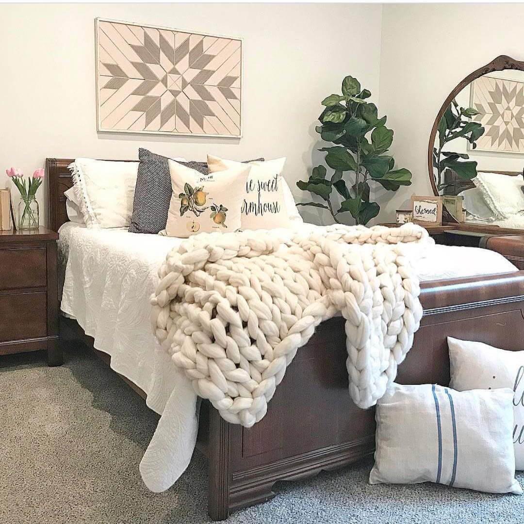 Geometric Wood Wall Art Adds Rustic Texture Above Bed