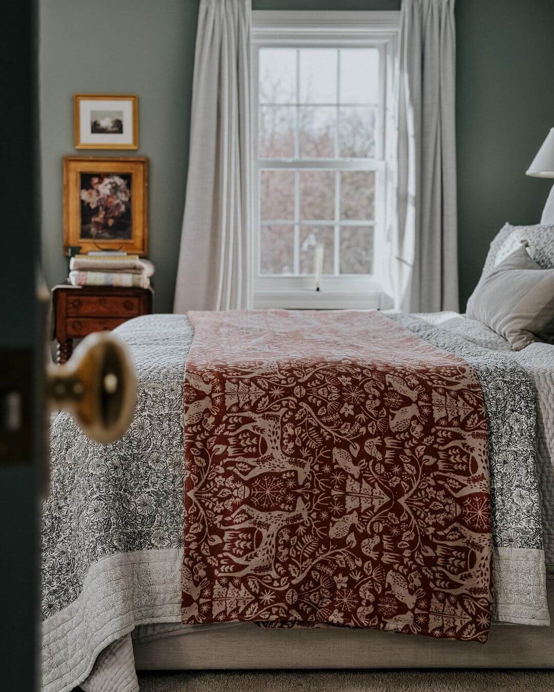 Layer a Bold Patterned Throw Over Your Bedding