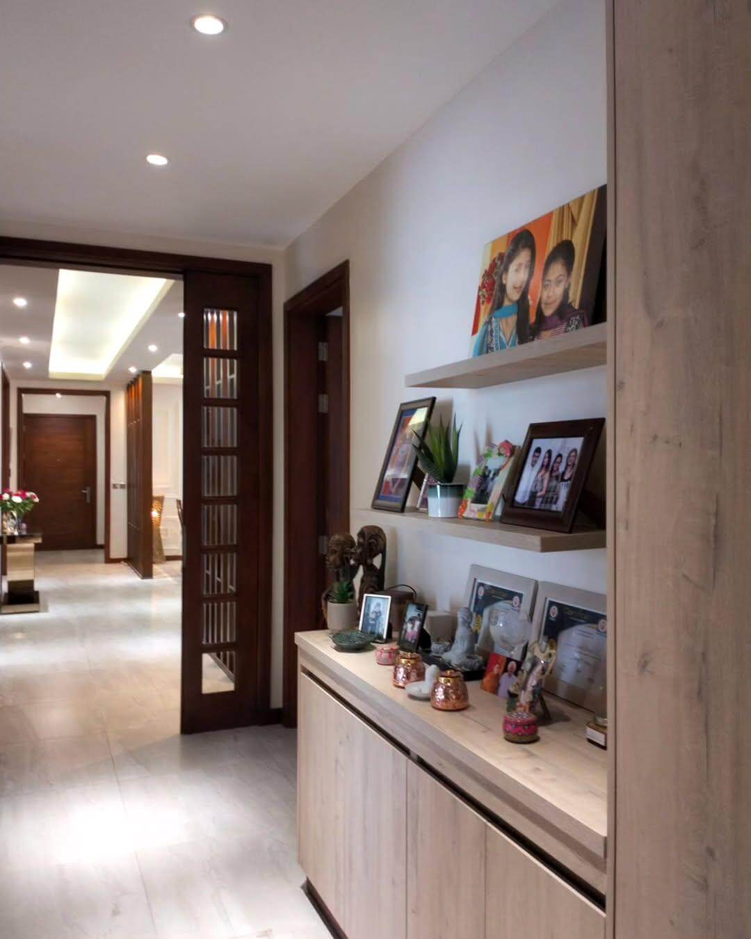 Floating Shelves Display Family Photos and Greenery