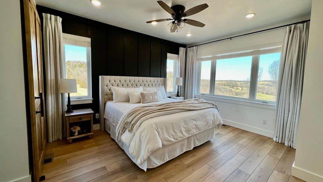 Paneled Black Accent Wall Creates Dramatic Backdrop for Bed