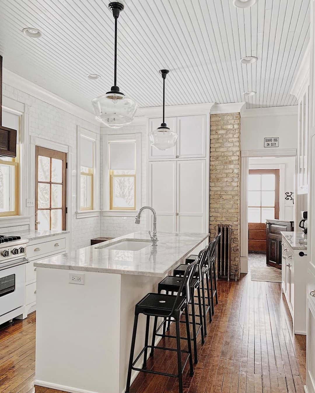 White Beadboard Ceiling With Recessed Lights Adds Brightness