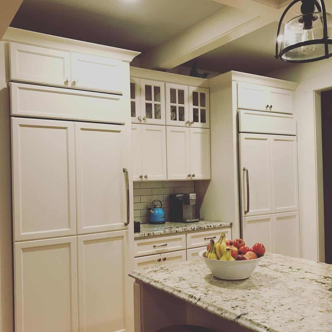 Recessed Beams Add Depth to White Kitchen Ceilings