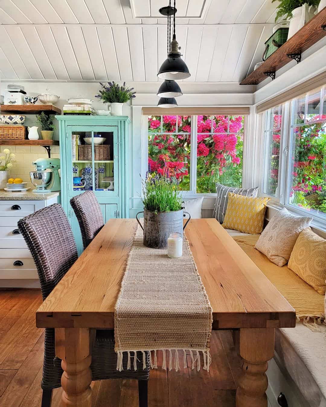Three-Tiered Pendant Lights Add Industrial Charm Above Dining Table