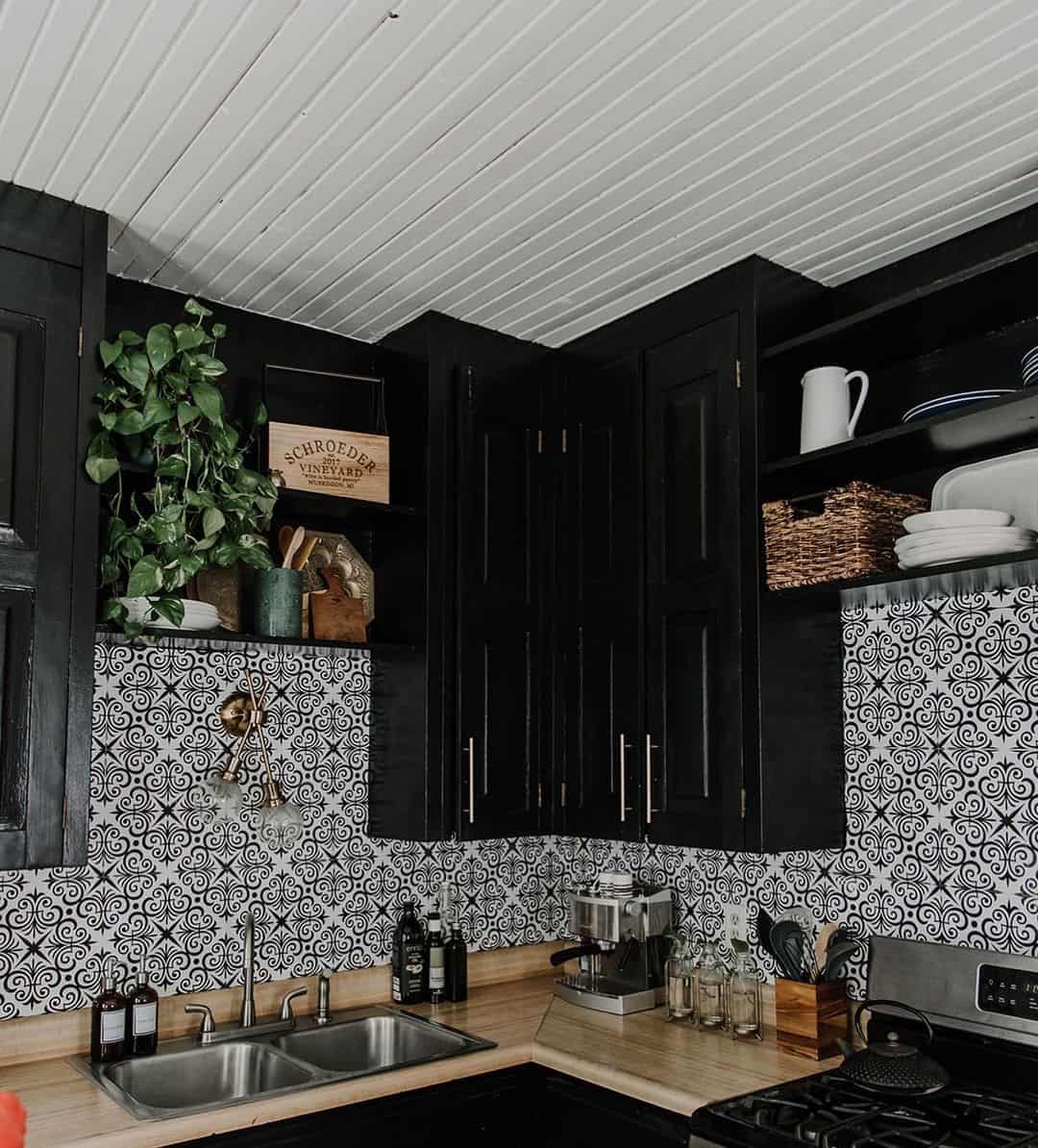 White Planked Ceiling Adds Brightness Above Black Kitchen Cabinets