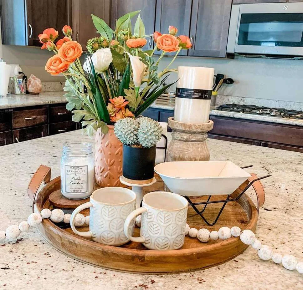 Textured Orange Vase Holds a Vibrant Mixed Floral Arrangement