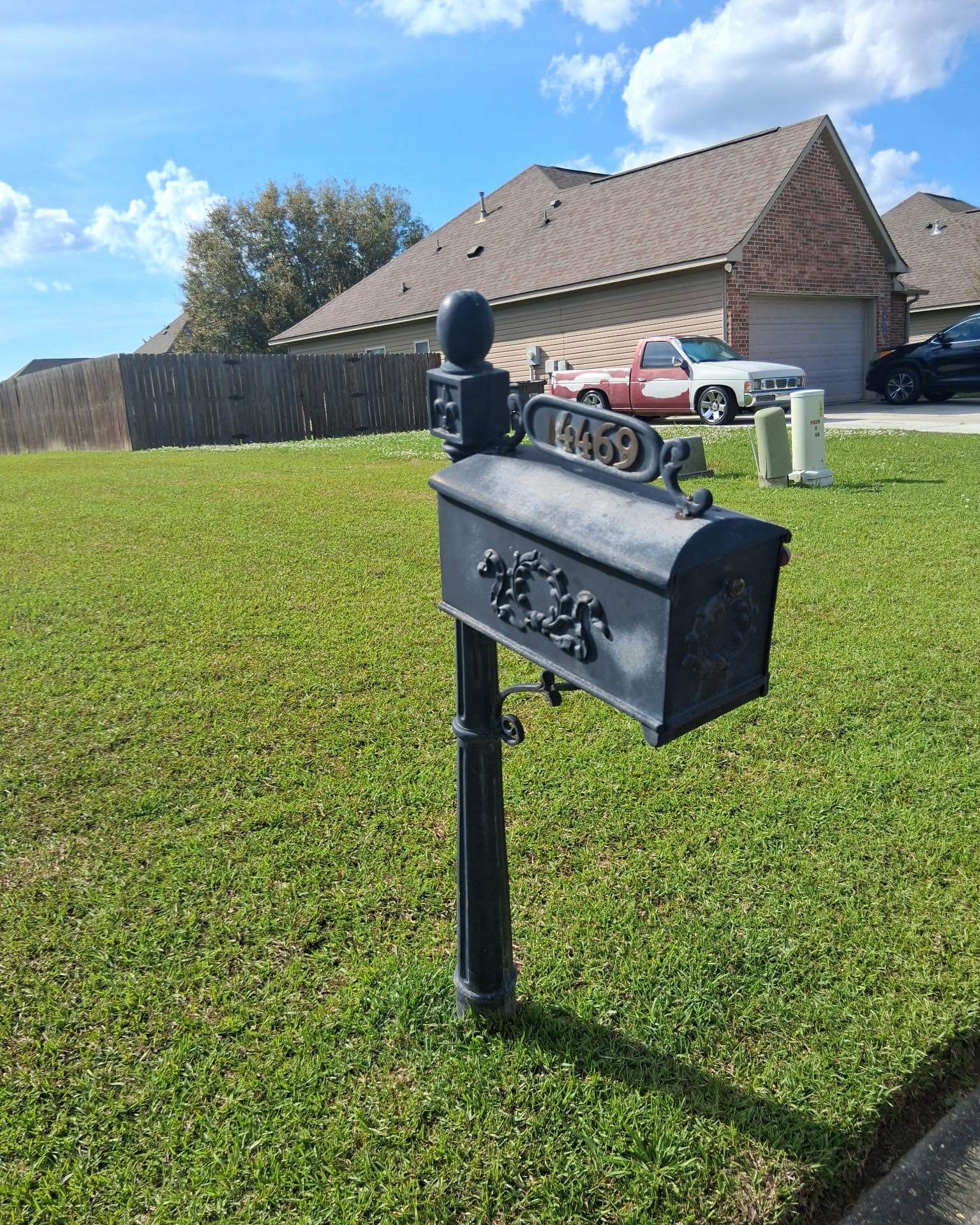 Ornate Black Mailbox with Raised Scrollwork and Gold Numbers