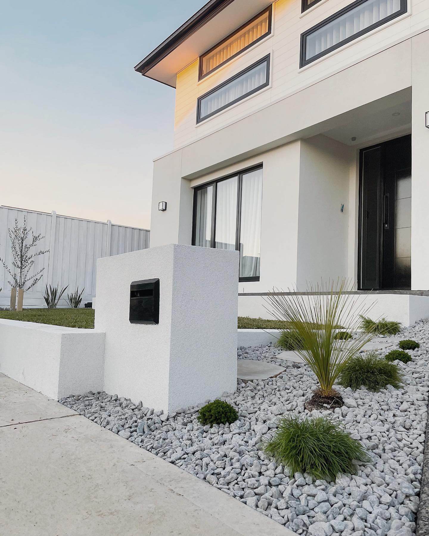 Sculptural Stucco Pillar with Integrated Mail Slot