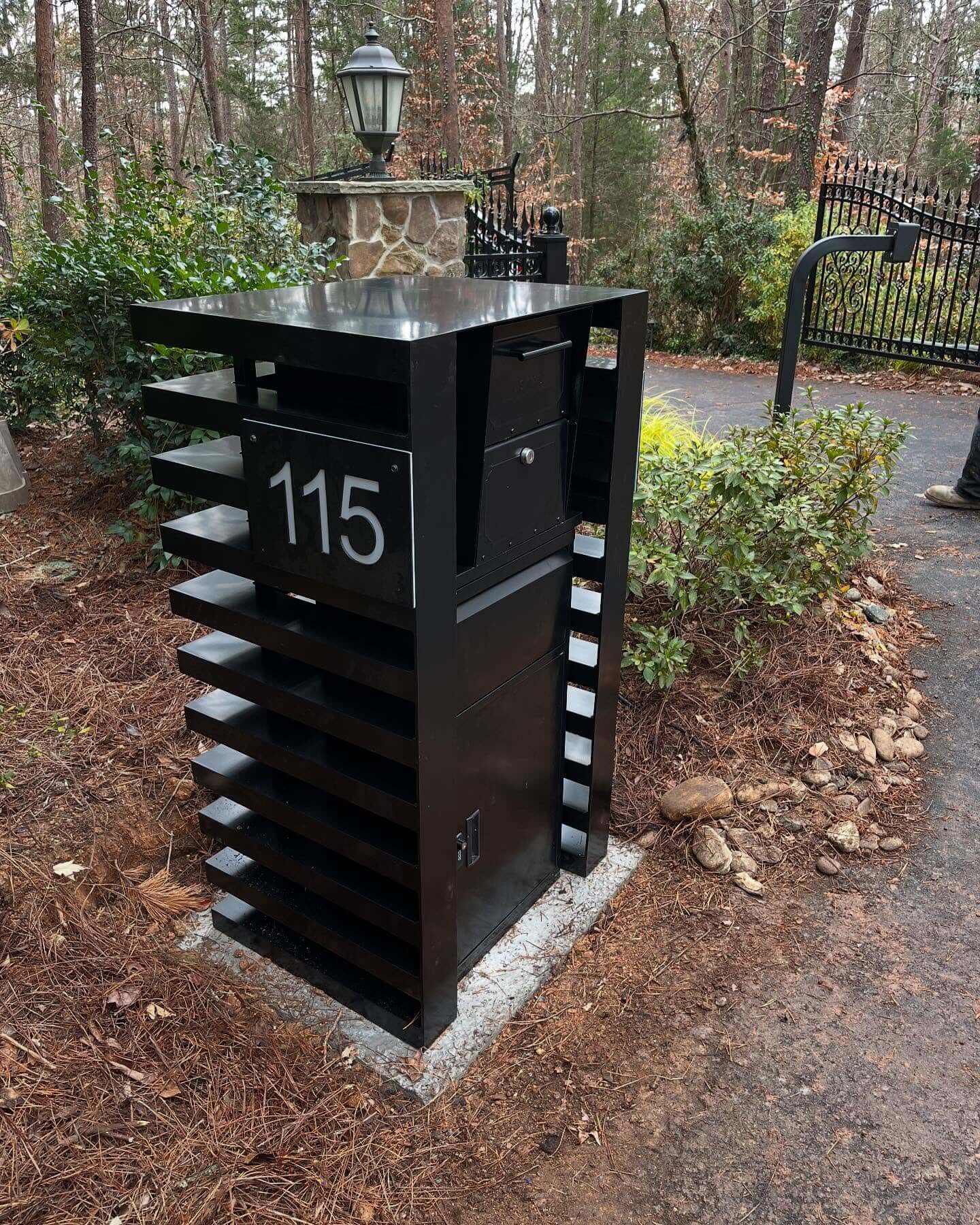 Black Mailbox with Horizontal Shelves for Small Plants