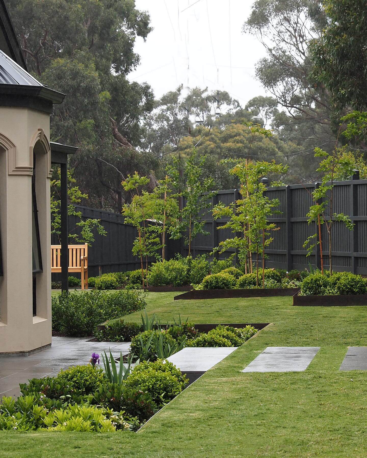 Establish a Modern Garden Path with Rectangular Concrete Slabs