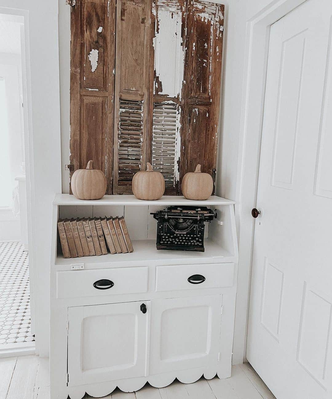 Distressed Shutters as a Rustic Wall Accent