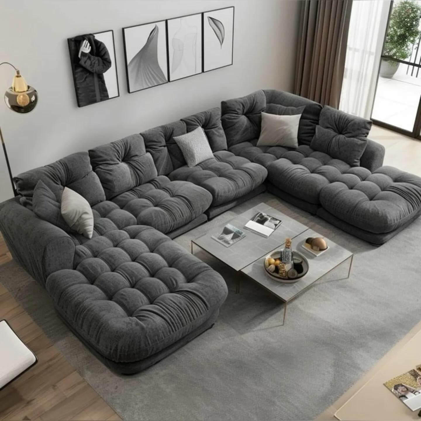 Define Lounge Zones with a Tufted U-Shaped Sofa