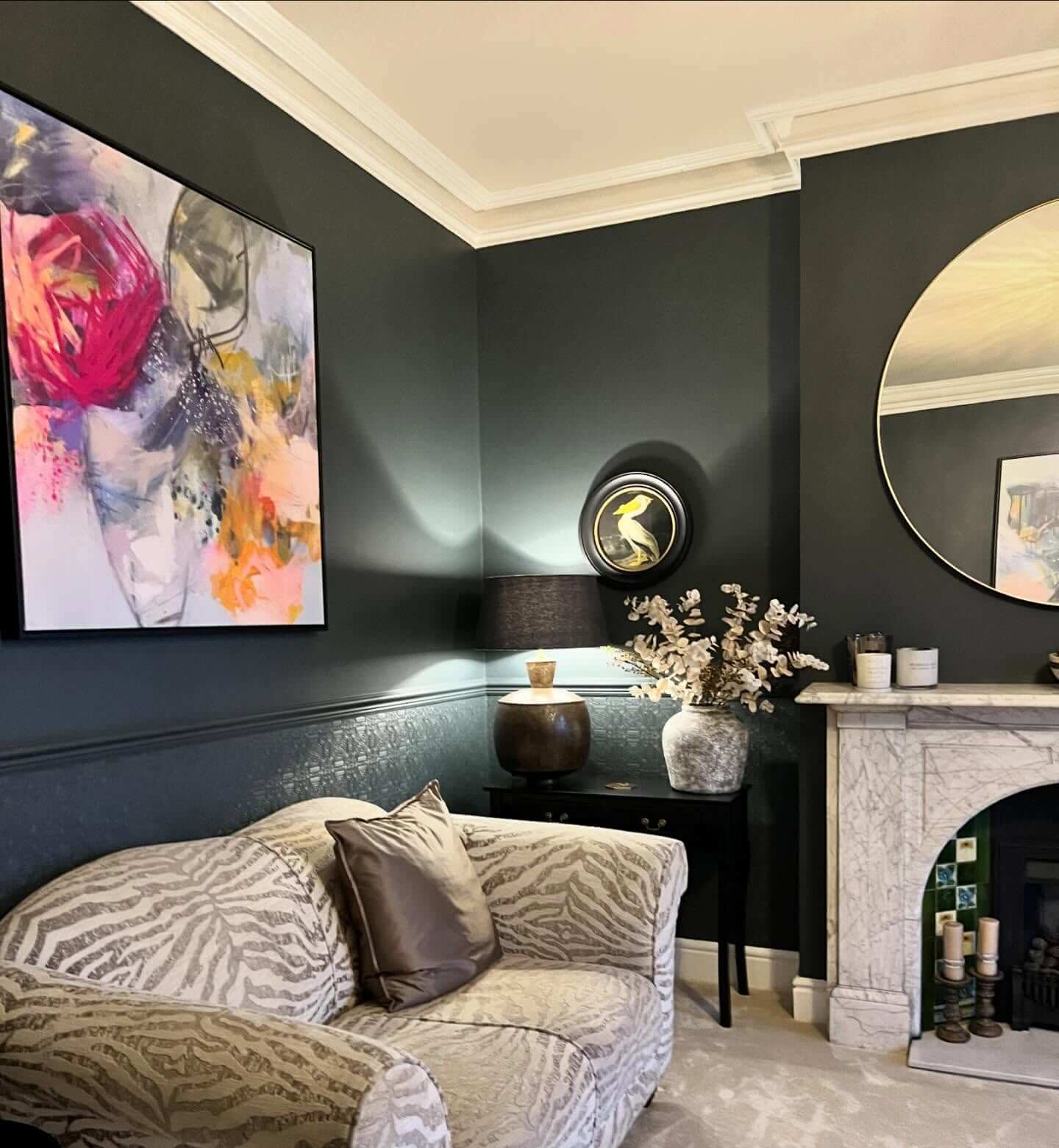 Large abstract art piece adds a vibrant focal point