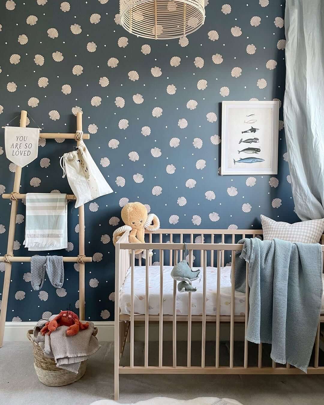 Nautical Shell Wallpaper Sets a Serene Blue Nursery Tone
