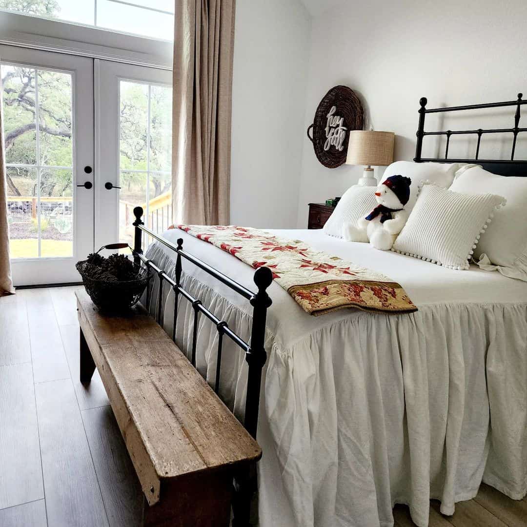 Place a Distressed Wooden Bench at the Foot of Your Bed