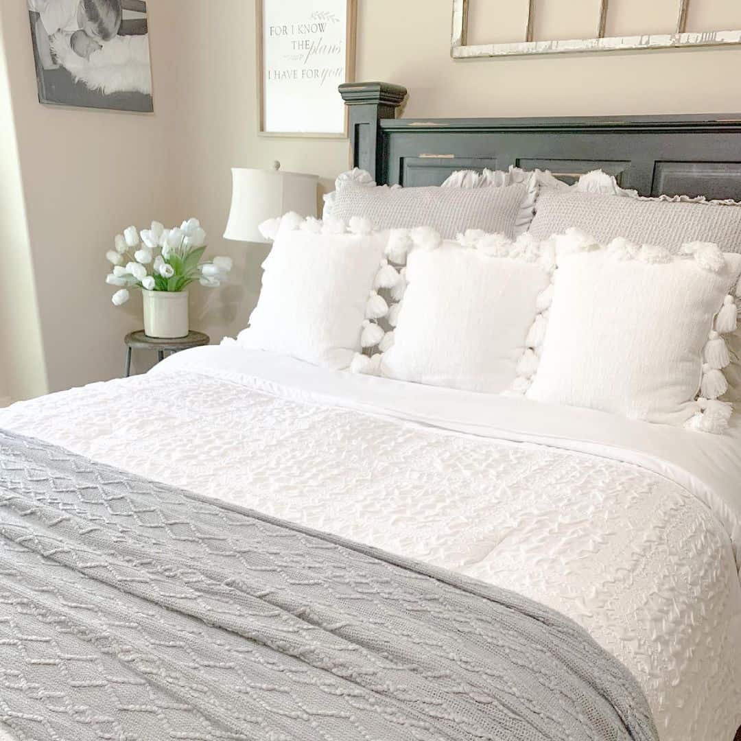 Introduce Playful Texture with White Pillows Featuring Tassels