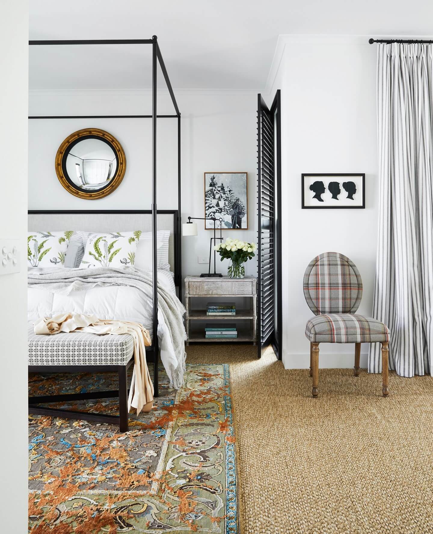 Round Mirror With Gold Frame Adds a Reflective Focal Point