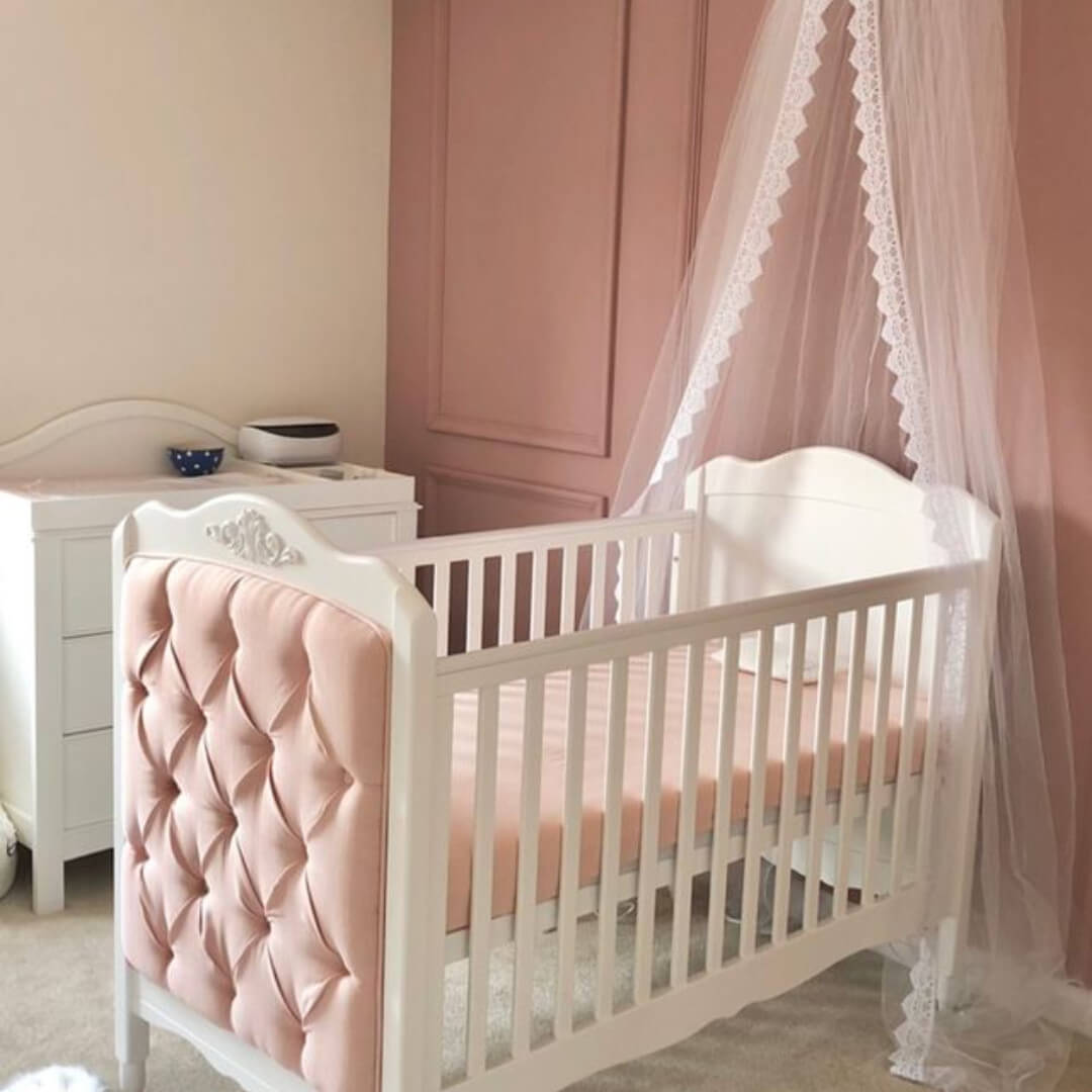 Tufted Pink Upholstery Adds a Soft, Luxe Headboard Detail