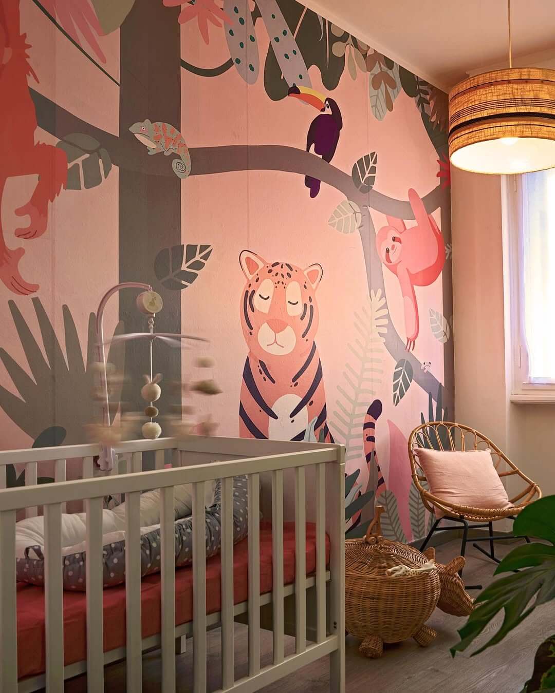 Bring Whimsical Wildlife to Pink Nursery Walls with a Jungle Mural