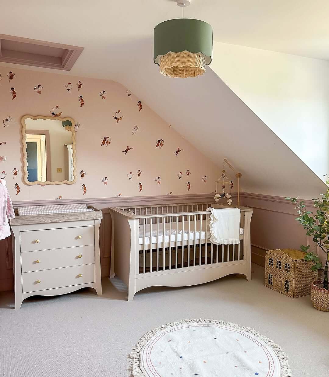 Inject Whimsy Above the Changing Table with a Scalloped Mirror