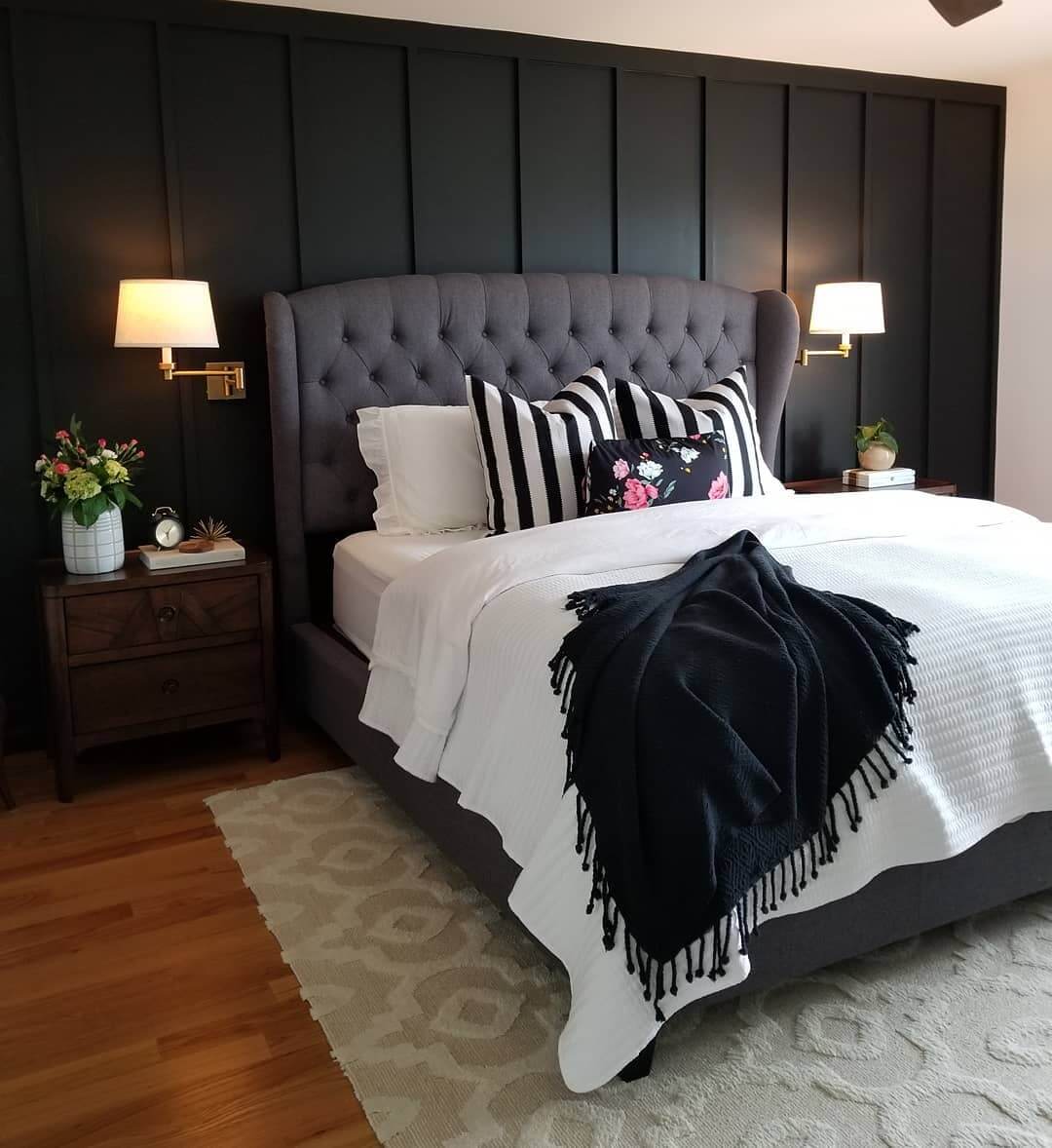 Vertical Wood Paneling Creates a Dramatic Dark Wall
