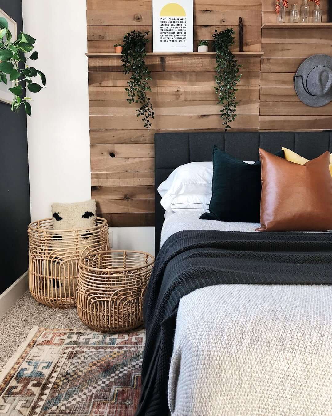 Woven Baskets Add Organic Texture to a Wood Plank Wall