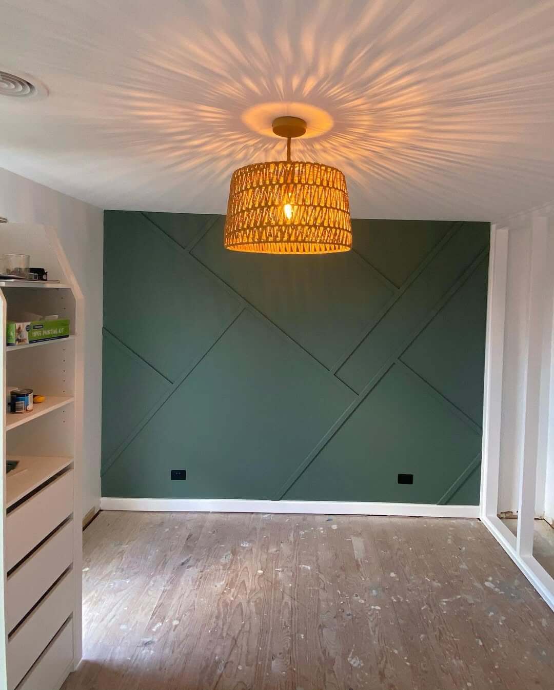 Geometric Wood Trim Creates a Modern Green Accent Wall