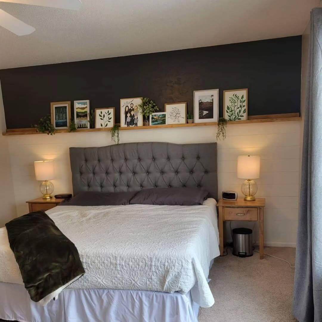 Floating Shelf Displays Art Above the Bed